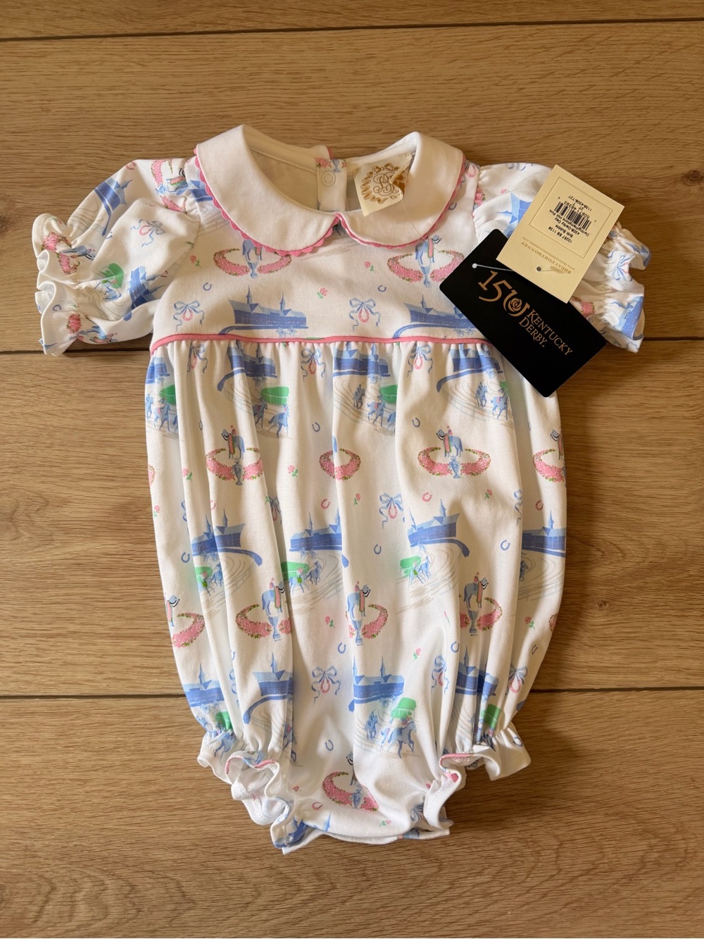 The Beaufort Bonnet Company White One-Piece Romper with Pink & Blue Trim